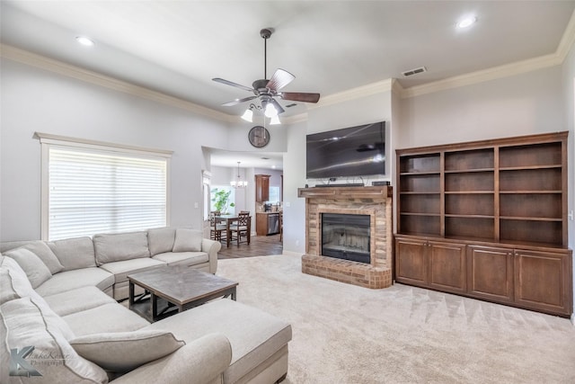4709 Spring Creek Rd, Abilene, TX 79602 - living room with a ceiling fan, ornamental molding, a chandelier, a fireplace, and recessed lighting