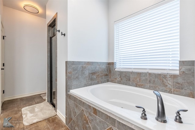 4709 Spring Creek Rd, Abilene, TX 79602 - full bathroom featuring a garden tub and a stall shower