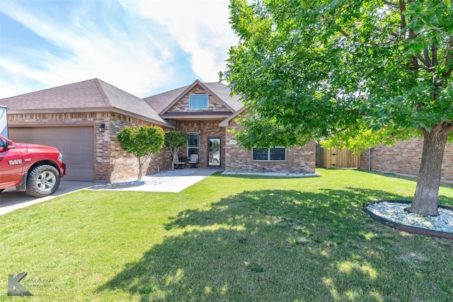 4709 Spring Creek Rd, Abilene, TX 79602 - view of front facade featuring brick siding, a garage, concrete driveway, and a shingled roof