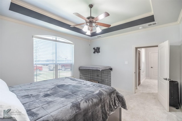 4709 Spring Creek Rd, Abilene, TX 79602 - carpeted bedroom with a raised ceiling, crown molding, ceiling fan, and baseboards