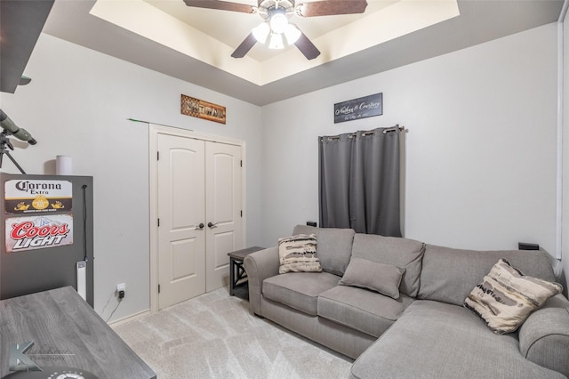 4709 Spring Creek Rd, Abilene, TX 79602 - living room with light carpet, a raised ceiling, ceiling fan, and baseboards