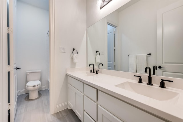 3201 Sunday Silence Ln, Celina, TX 75009 - full bathroom with double vanity, toilet, baseboards, and bathtub / shower combination