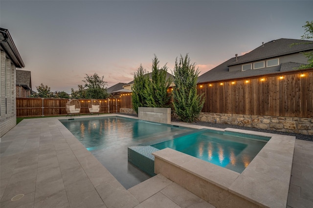3201 Sunday Silence Ln, Celina, TX 75009 - pool at dusk featuring a fenced backyard and a patio area