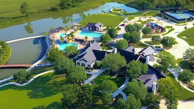 3201 Sunday Silence Ln, Celina, TX 75009 - drone / aerial view of a pool area and a nearby body of water