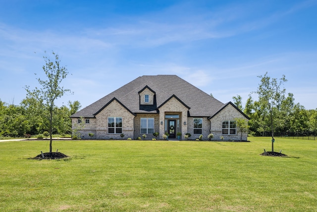 418 Sundance Trl, Sunnyvale, TX 75182 - french country inspired facade featuring a front yard, brick siding, and a shingled roof