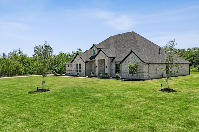418 Sundance Trl, Sunnyvale, TX 75182 - french country home with a front lawn, a shingled roof, and brick siding