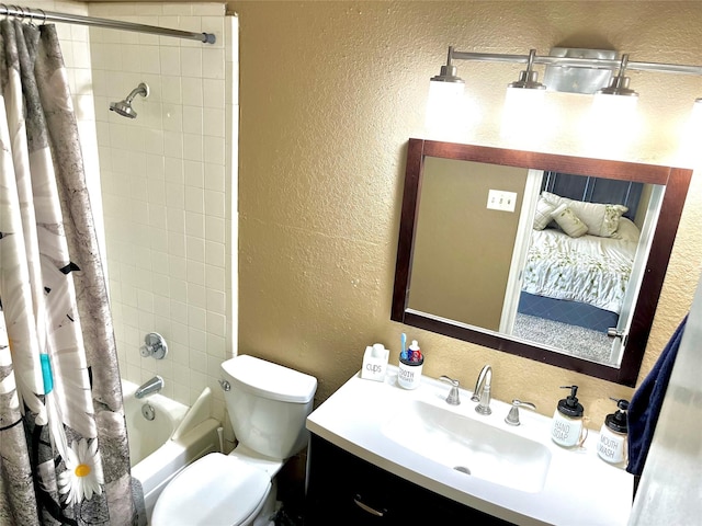 328 Branson Rd, Roanoke, TX 76262 - bathroom with a textured wall, toilet, vanity, and shower / tub combo