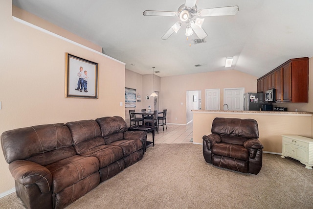 4720 Topaz Ln, Granbury, TX 76049 - living area featuring ceiling fan, light colored carpet, vaulted ceiling, baseboards, and light tile patterned flooring
