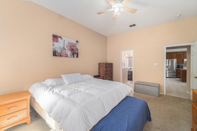 4720 Topaz Ln, Granbury, TX 76049 - bedroom featuring stainless steel fridge with ice dispenser, light colored carpet, ensuite bath, and a ceiling fan