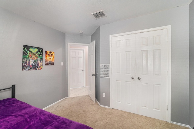 4720 Topaz Ln, Granbury, TX 76049 - bedroom with carpet flooring, a closet, and baseboards