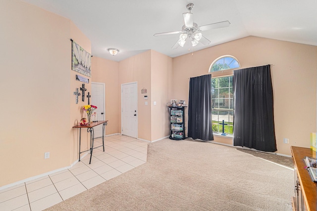 4720 Topaz Ln, Granbury, TX 76049 - tiled foyer with a ceiling fan, carpet, lofted ceiling, and baseboards