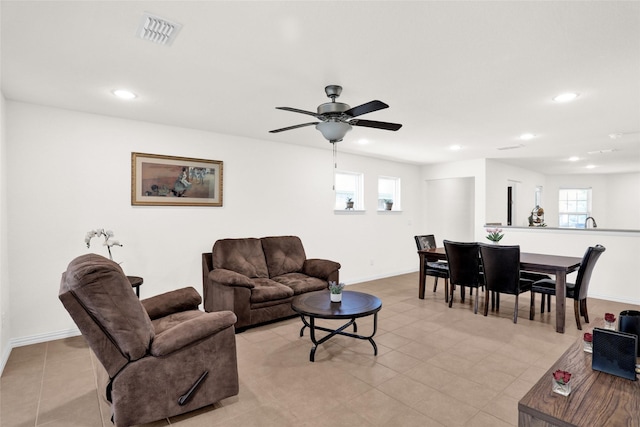 8857 Shore Crest Rd, Frisco, TX 75036 - living area with recessed lighting, healthy amount of natural light, ceiling fan, baseboards, and light tile patterned floors