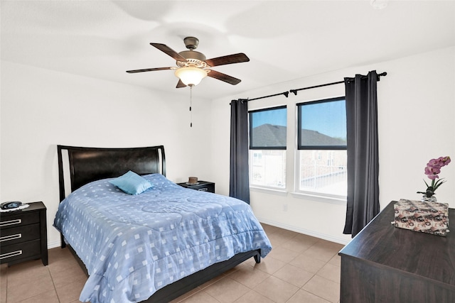 8857 Shore Crest Rd, Frisco, TX 75036 - bedroom with light tile patterned floors, baseboards, and ceiling fan
