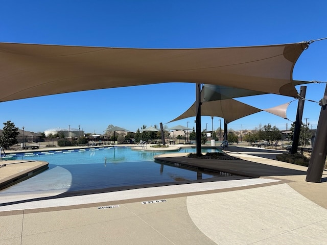 8857 Shore Crest Rd, Frisco, TX 75036 - community pool featuring a patio