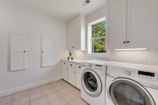 3829 Fm 896, Leonard, TX 75452 - laundry room with separate washer and dryer, baseboards, cabinet space, and light tile patterned flooring