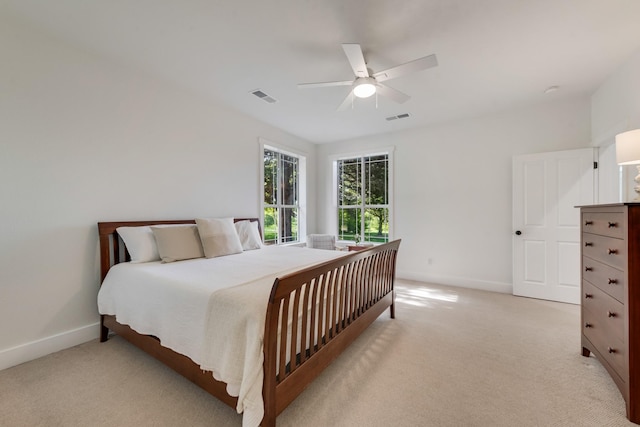 3829 Fm 896, Leonard, TX 75452 - bedroom featuring baseboards, light carpet, and ceiling fan