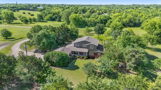 3829 Fm 896, Leonard, TX 75452 - view of subject property featuring a heavily wooded area