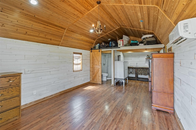 227 W Lipan Dr, Lipan, TX 76462 - bedroom with an AC wall unit, lofted ceiling, wood walls, wooden ceiling, and wood finished floors