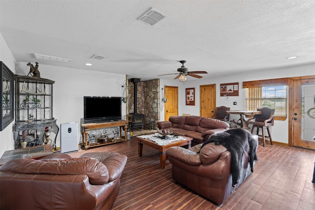 227 W Lipan Dr, Lipan, TX 76462 - living area with a wood stove, a textured ceiling, wood finished floors, a ceiling fan, and recessed lighting