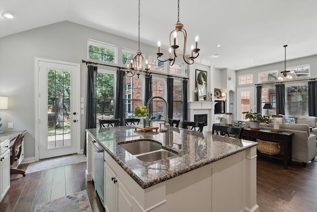 1416 Basil Dr, Flower Mound, TX 75028 - kitchen with a sink, dark wood-type flooring, plenty of natural light, recessed lighting, and vaulted ceiling