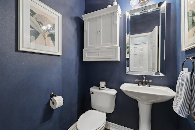 1416 Basil Dr, Flower Mound, TX 75028 - bathroom with toilet and baseboards