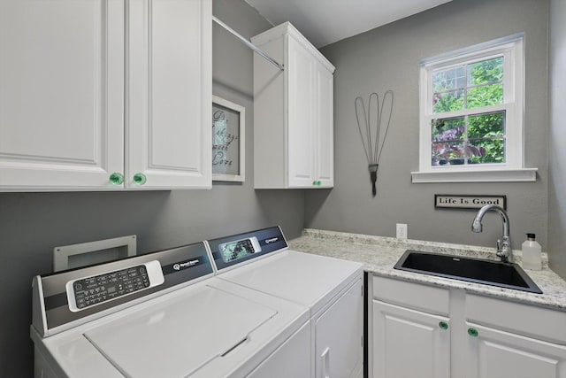 1416 Basil Dr, Flower Mound, TX 75028 - laundry area with washer and clothes dryer and cabinet space