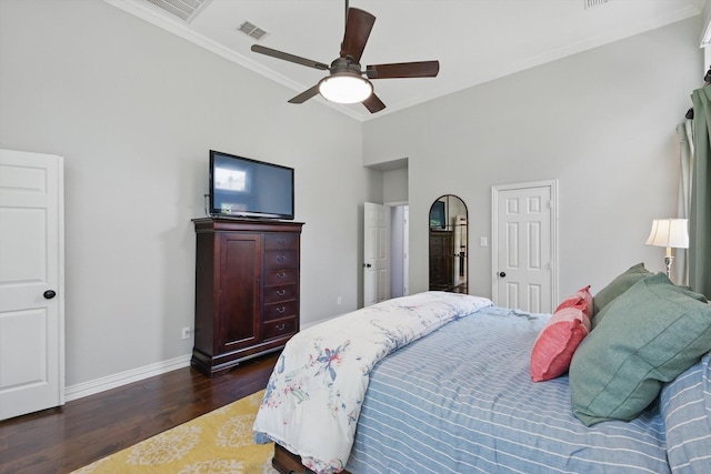 1416 Basil Dr, Flower Mound, TX 75028 - bedroom featuring dark wood-style flooring, ornamental molding, baseboards, and a ceiling fan