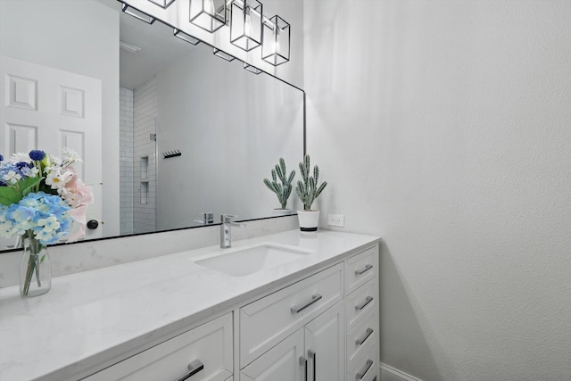 1416 Basil Dr, Flower Mound, TX 75028 - bathroom with vanity and a tile shower