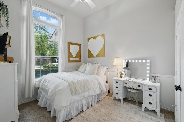 1416 Basil Dr, Flower Mound, TX 75028 - bedroom featuring ceiling fan and a wainscoted wall