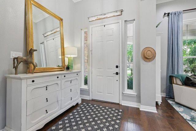 1416 Basil Dr, Flower Mound, TX 75028 - entryway with baseboards and dark wood-type flooring