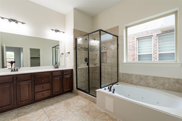 10909 Blake Gdns, Mckinney, TX 75072 - full bathroom with a whirlpool tub, a shower stall, double vanity, and tile patterned flooring