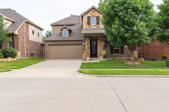 10909 Blake Gdns, Mckinney, TX 75072 - traditional-style home featuring a front yard, driveway, an attached garage, roof with shingles, and brick siding