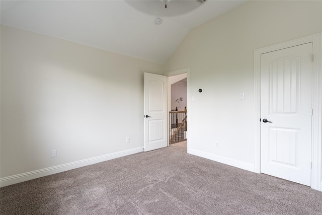 10909 Blake Gdns, Mckinney, TX 75072 - unfurnished bedroom with carpet flooring, vaulted ceiling, and baseboards