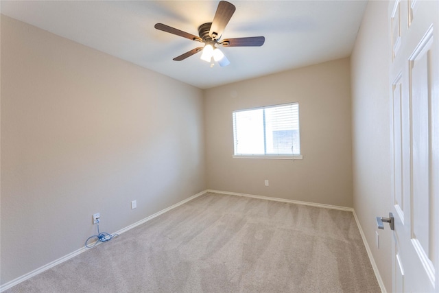 3015 Oak Dr, Rockwall, TX 75032 - empty room with light carpet, a ceiling fan, and baseboards