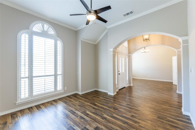 3015 Oak Dr, Rockwall, TX 75032 - empty room featuring arched walkways, dark wood-style flooring, plenty of natural light, decorative columns, and crown molding
