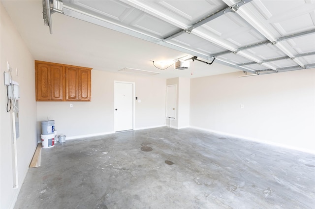 3015 Oak Dr, Rockwall, TX 75032 - garage featuring a garage door opener