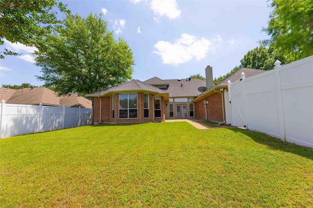 3015 Oak Dr, Rockwall, TX 75032 - back of property with brick siding