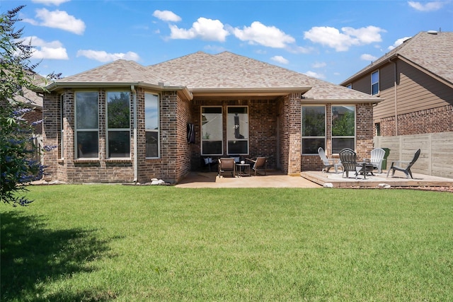 1805 13th St, Argyle, TX 76226 - back of house with brick siding, a patio, and a shingled roof