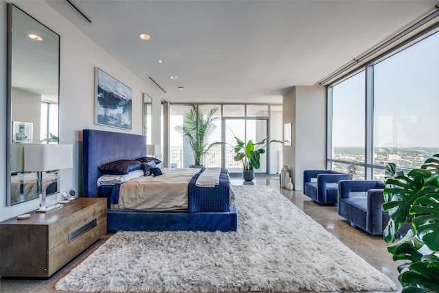 1717 Arts Plz Unit 2202, Dallas, TX 75201 - bedroom featuring a wall of windows