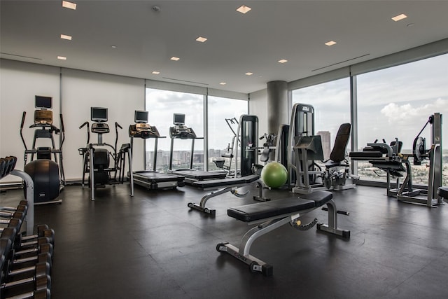 1717 Arts Plz Unit 2202, Dallas, TX 75201 - exercise room featuring a wall of windows