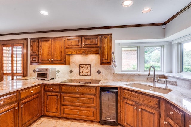 3308 Runabout Ct, Plano, TX 75023 - kitchen with a sink, light stone counters, brown cabinets, tasteful backsplash, and crown molding
