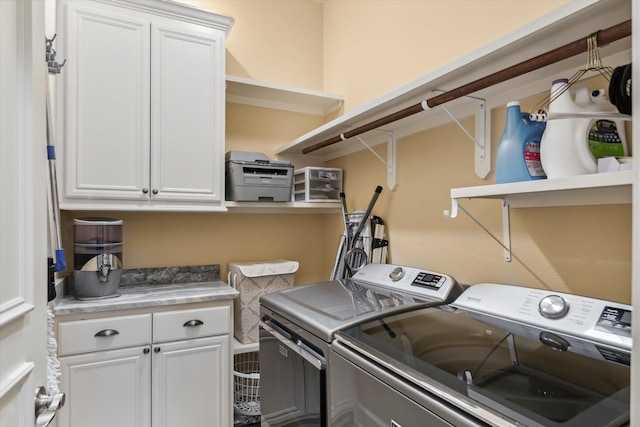 3351 Cascades Ct Unit 306, Tyler, TX 75709 - laundry room featuring washer and clothes dryer and cabinet space