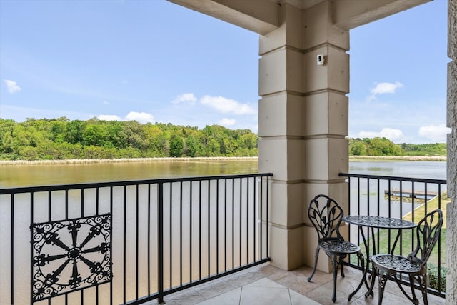 3351 Cascades Ct Unit 306, Tyler, TX 75709 - balcony with a water view and a wooded view