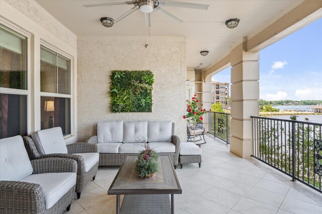 3351 Cascades Ct Unit 306, Tyler, TX 75709 - balcony with a ceiling fan and outdoor lounge area