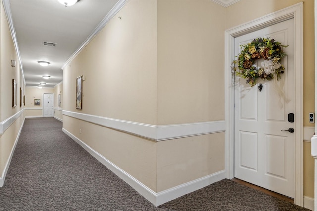 3351 Cascades Ct Unit 306, Tyler, TX 75709 - hallway featuring dark carpet, crown molding, and baseboards