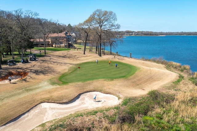 3351 Cascades Ct Unit 306, Tyler, TX 75709 - surrounding community with a putting green, a water view, and golf course view