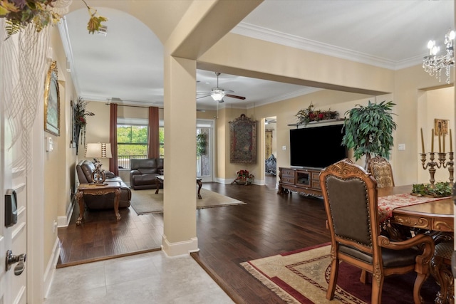 3351 Cascades Ct Unit 306, Tyler, TX 75709 - dining space featuring crown molding, ceiling fan, baseboards, and wood finished floors