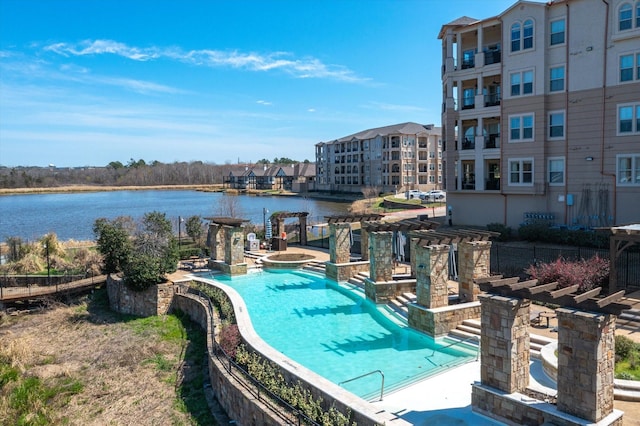 3351 Cascades Ct Unit 306, Tyler, TX 75709 - community pool featuring a water view, a pergola, and an outdoor hot tub