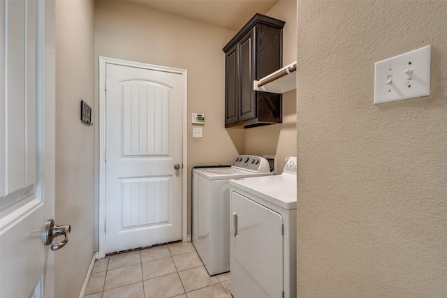 2613 Hillrich Dr, Anna, TX 75409 - laundry area featuring independent washer and dryer, cabinet space, and light tile patterned floors