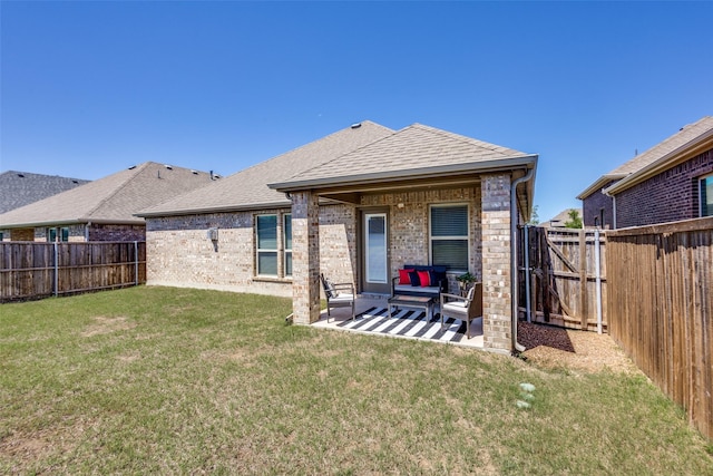 2613 Hillrich Dr, Anna, TX 75409 - rear view of property with brick siding, a patio area, an outdoor hangout area, and a shingled roof
